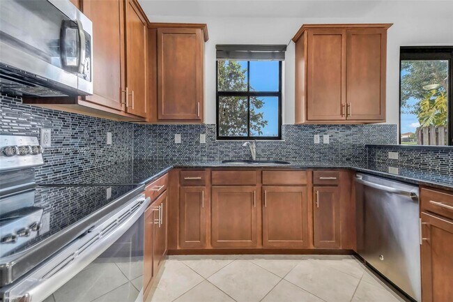 Building Photo - 9583 Town Parc Cir N