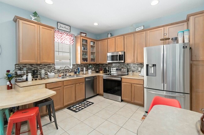 Building Photo - MOVE IN SPECIAL- 3/2.5 Townhome W/ 2 Car Garage For Rent in the Highly Desirable Avalon Park Comm...
