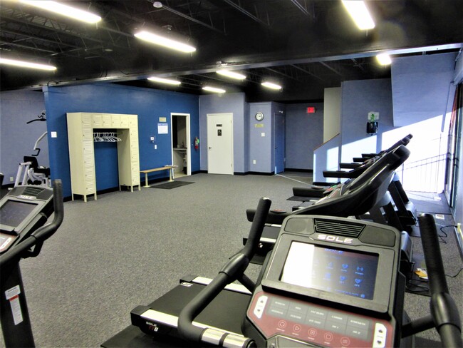 interior private tenant fitness center - 409 W Maple St