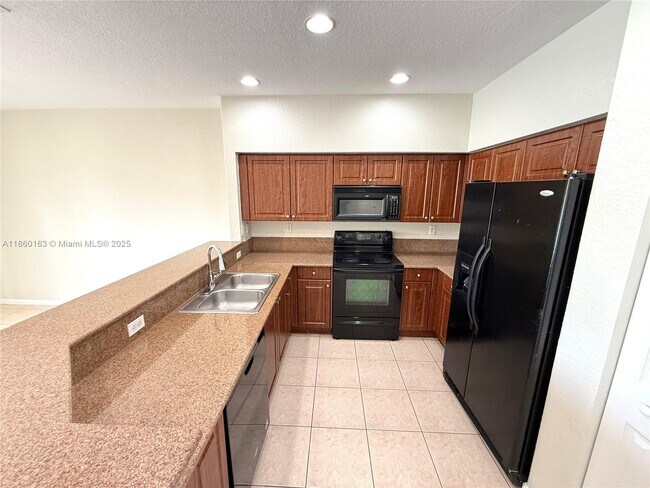 Building Photo - 8380 SW 25th Ct