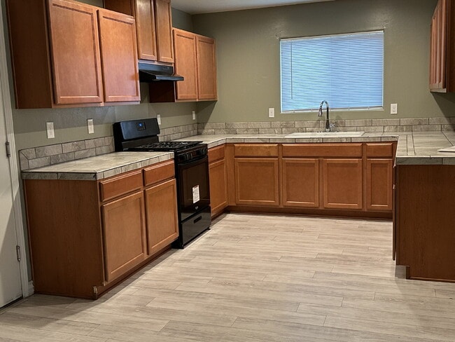 Building Photo - A Perfect Blend of Space & Convenience in This 3-Bedroom Charmer