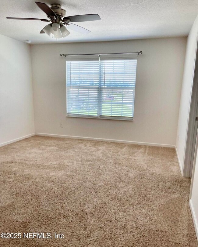 Building Photo - 8709 Lake George Cir E