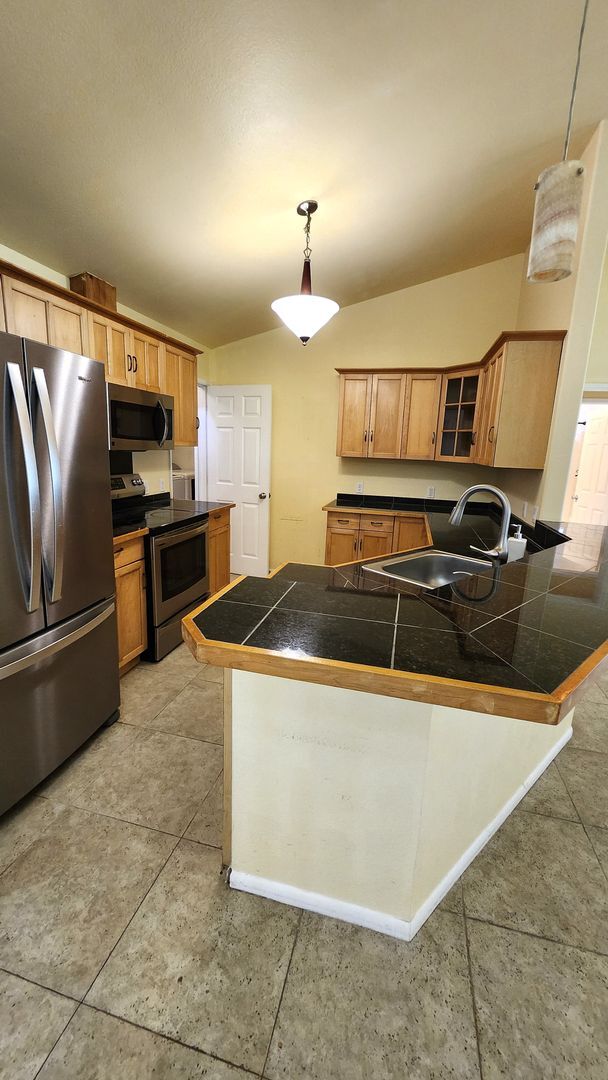 Building Photo - Ah Puck, Jordanah &amp; Tyson