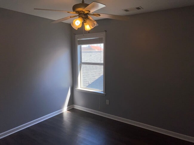 Building Photo - Rare home on the island! Large fenced in back yard! Pets are allowed. Owner will manage.