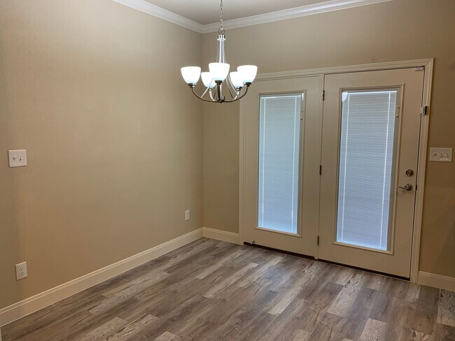 Building Photo - Solar Panels and Alarm System Included!!
