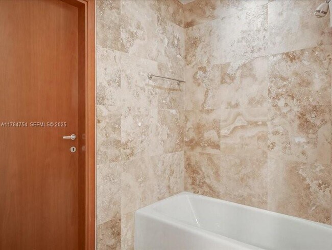 Building Photo - 9499 Collins Ave