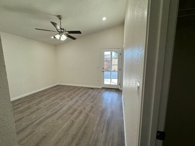 Building Photo - Freshly Remodeled 4 bedroom in Red Rock- RV Parking, low maintenance yard and pets welcome!