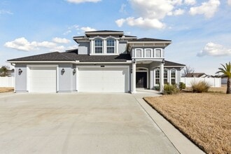 Building Photo - Spacious 5-Bedroom Home with Office, Den & Included Electric!