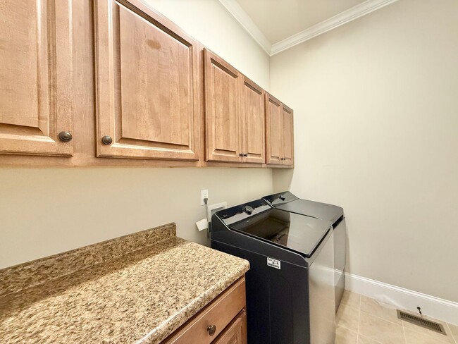 Building Photo - Luxurious 3BD, 4BA Raleigh Townhome with a Bonus Sunroom, Jacuzzi, and Large Upstairs Loft within...