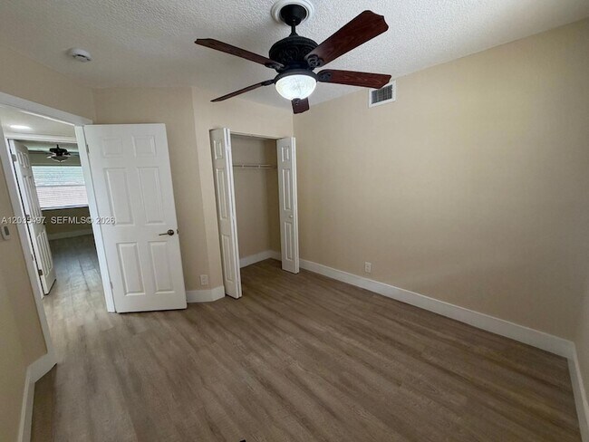 Building Photo - 8443 Royal Palm Blvd