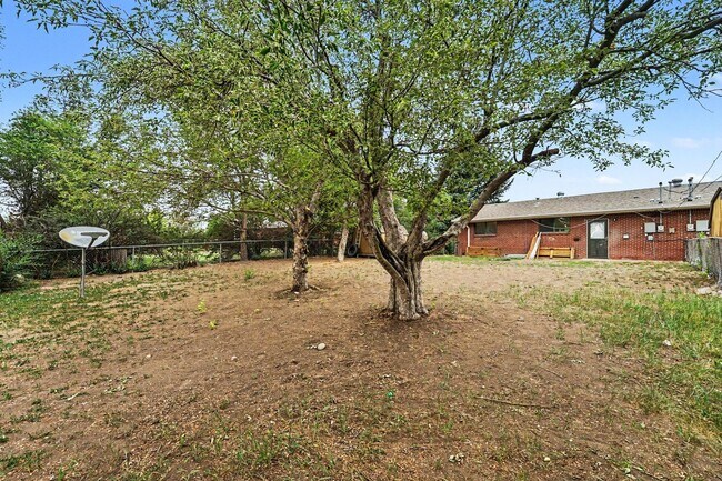 Building Photo - Spacious 3-Bedroom Home with Refinished Hardwood Floors, Fresh Interior Paint, Private Fenced Yar...