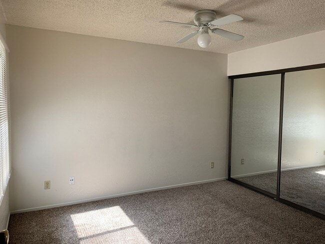 Building Photo - ENJOY THE POOL THIS SUMMER IN THIS GATED C...