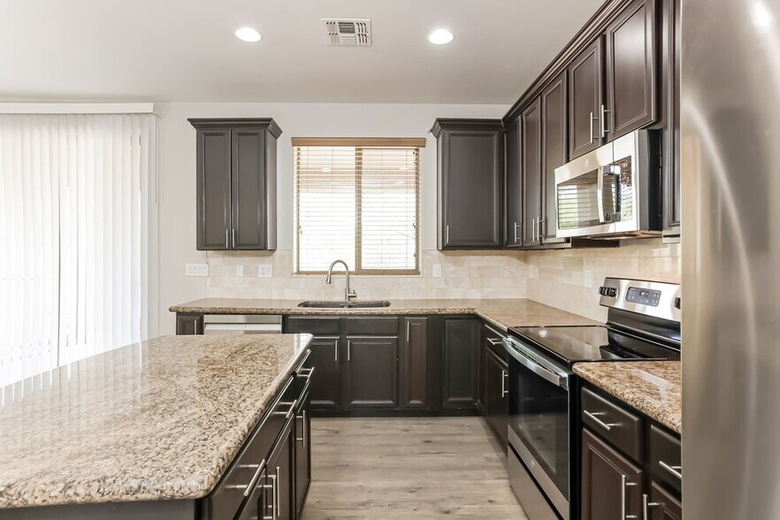 Building Photo - 6842 W Nadine Way