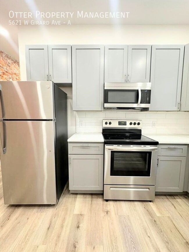 Building Photo - 5621 W Girard Ave