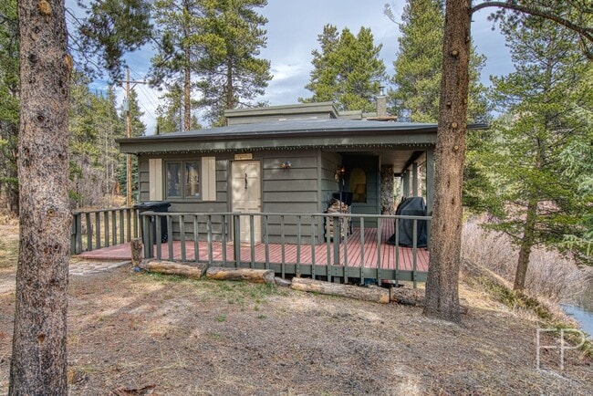 Building Photo - On the Blue River!  HUGE 4 Bedroom home, Furnished Updates throughout!  Bus route!  Spacious parking