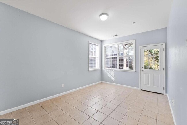 Building Photo - 4674 Creekside Villas Way