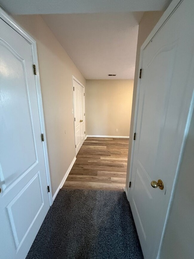 Building Photo - 2-bedroom, 1.5-bath townhouse with an attached garage