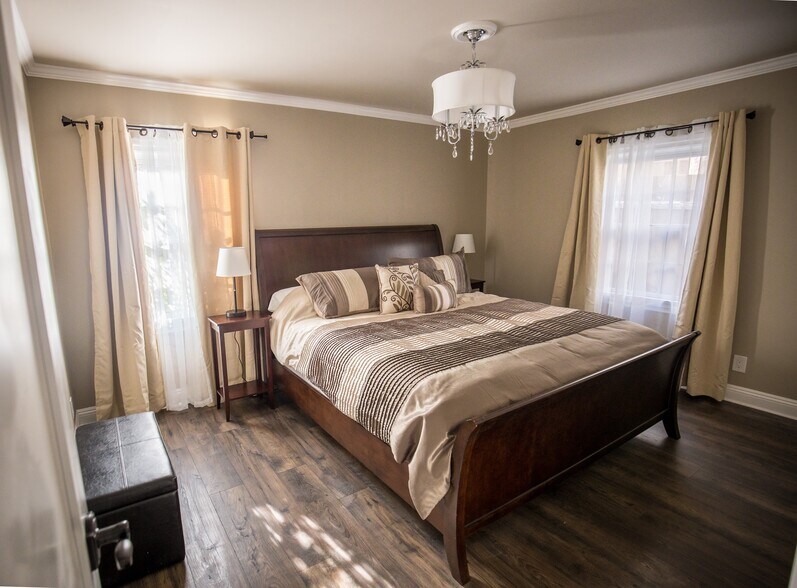 Main bedroom can fit a king. (Headboard is flipped from previous photo to show options.) - 1327 S Sycamore Ave