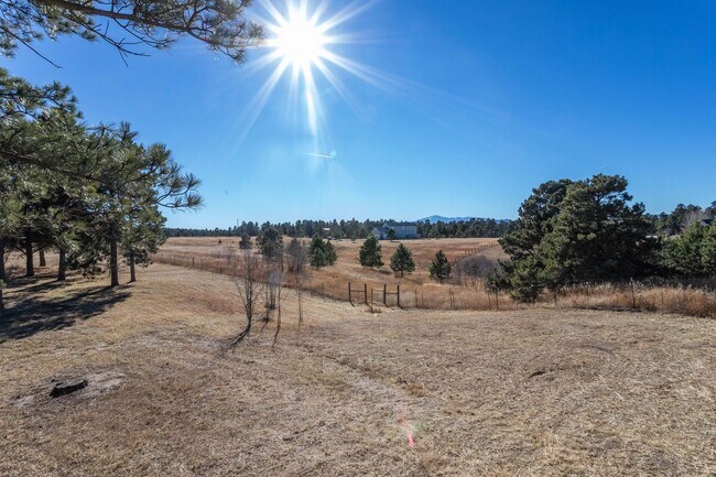 Building Photo - Spacious Country Retreat on 5.5 Acres | Barn, Deck & Pikes Peak View!!