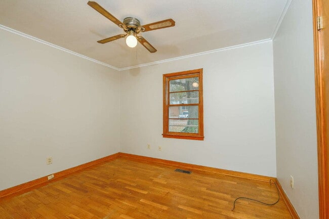 Building Photo - "Charming 3-Bedroom Greenfield Home with Gleaming Hardwood Floors – 1256 Sq Ft of Cozy Comfort!"