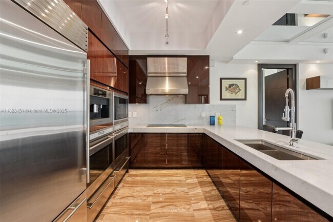 Building Photo - 9703 Collins Ave