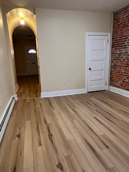 View from dining room into living room - 507 N Rodney St