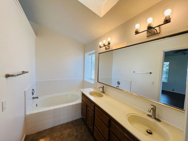 Building Photo - Spacious and Sparkling with New Paint 3 be...