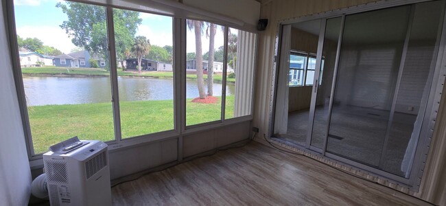 Building Photo - 2 bed 2 baths with carport