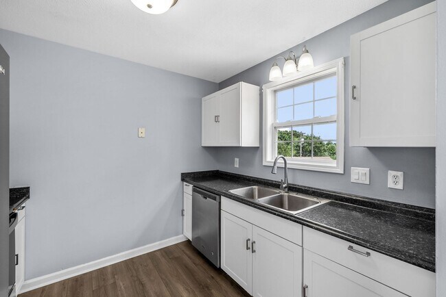 Building Photo - Pet Friendly Three Bedroom with Basement!