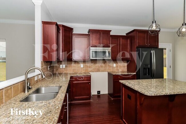 Building Photo - 5695 Saint Adriens Way