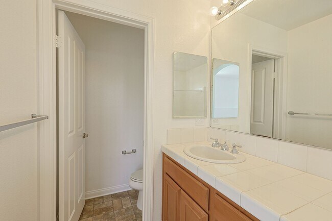 Building Photo - La Mesa 2BR + Office Room Townhome-Style Condo with 2-Car Garage Parking