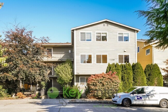 Building Photo - **Rent Special** Remodeled Two-Bedroom with Open Floor Plan, Parking, and Easy Transit Access