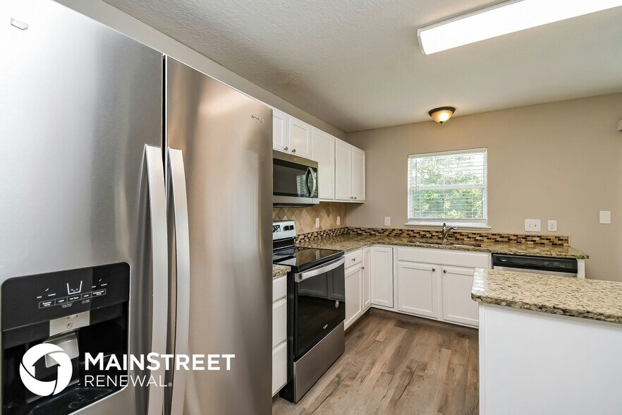 Building Photo - 9273 Caracara Drive