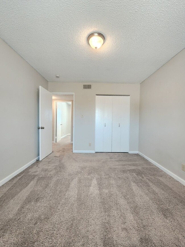 Building Photo - 4 Bedroom Two-Story Home with Downstairs Primary Bedroom & Fireplace