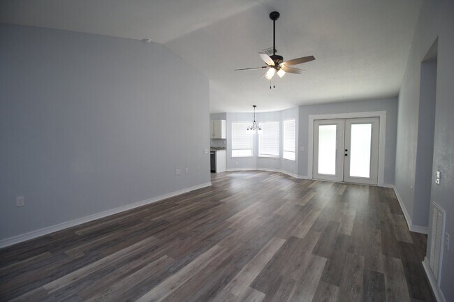 Building Photo - Updated Fox Hollow 3BR Home Near 9 Mile Rd with LVP Flooring, Granite Kitchen, 2-Car Garage & Fen...