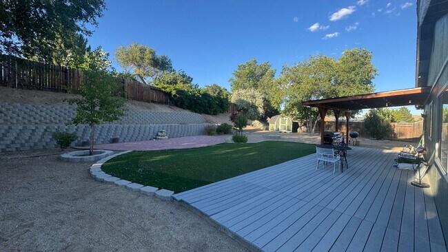 Building Photo - 4bed/2bath/2car garage. RV parking & massive landscaped backyard in cut-de-sac