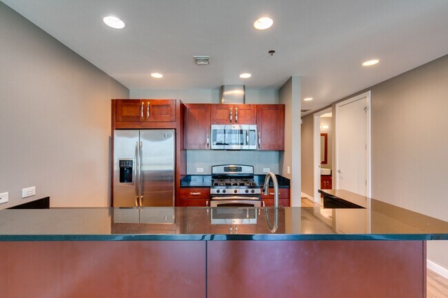 Building Photo - Iconic Strip-View Luxury | Elegant 1BR + Den High-Rise Residence