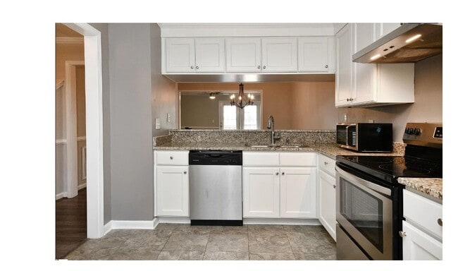 Building Photo - Charming 2-bedroom, 2.5-bathroom townhouse...
