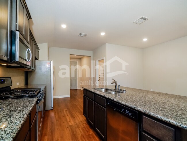 Building Photo - 8105 Cottage Rose Dr