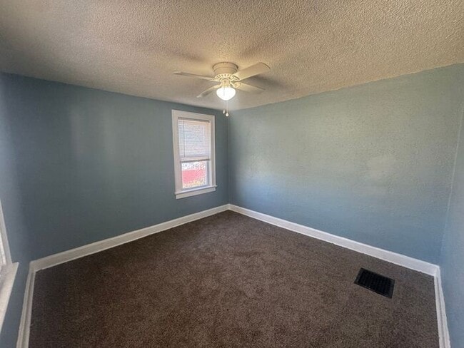 Building Photo - Charming 3BR 2BA Home w/ Fenced Yard + Covered Porch in KC