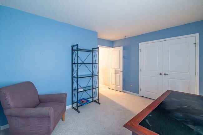 Building Photo - Spacious 4-Bedroom Home with Sunroom, Deck...