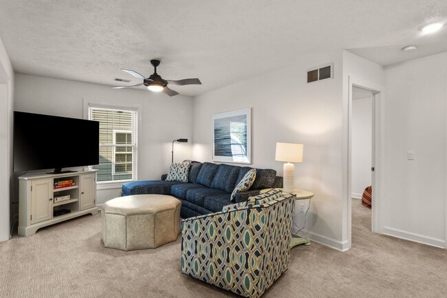 Building Photo - Furnished Pet-Friendly 30-Day Extended Stay Riverfront Condo