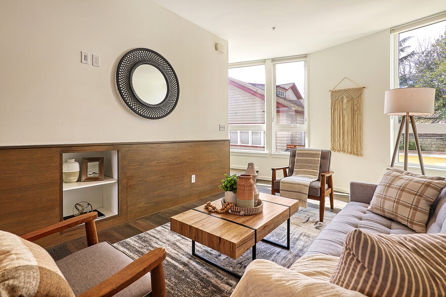 Living room has a built in entertainment nook and cabling chase. - 818 N 47th St