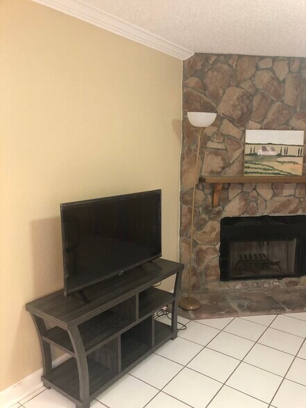 Tv and fireplace - 734 G Village Drive