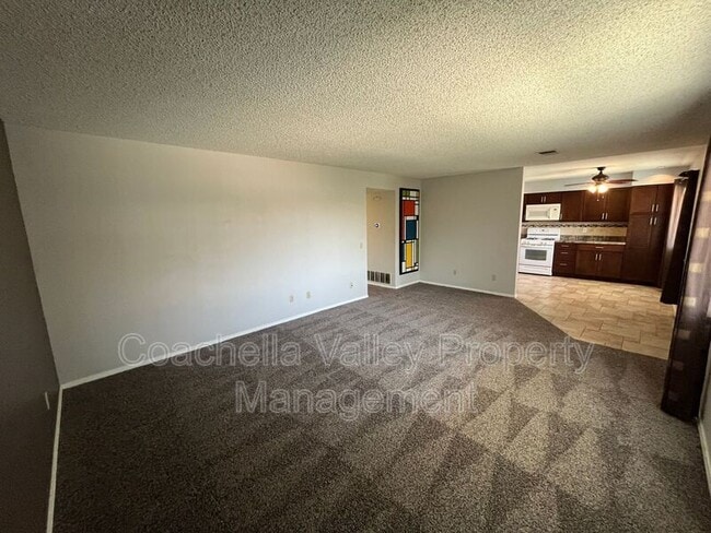 Building Photo - 1950 S Palm Canyon Dr