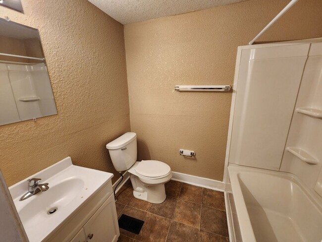 Building Photo - 4 Bedroom, 2 Bathroom home with large yard...