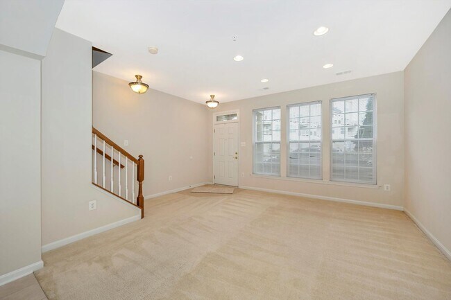 Building Photo - Desirable Two Level Condo For Lease - Not Pet Friendly