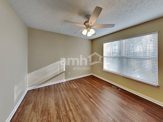 Building Photo - 8685 Woolstone Ct