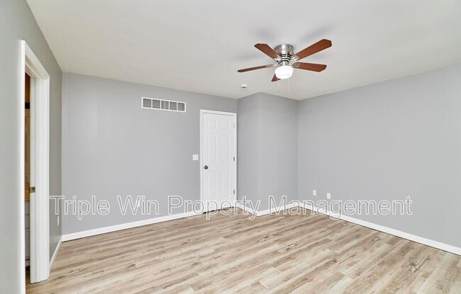 Building Photo - 4927 Triple Tree Ct
