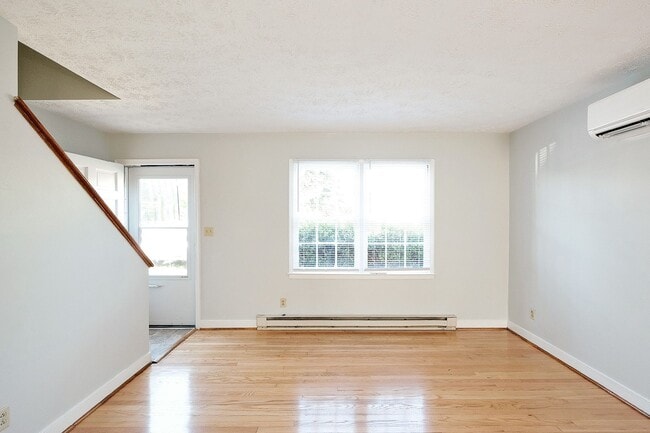 Building Photo - Small Dog-Friendly Woolen Mills Duplex Near Downtown